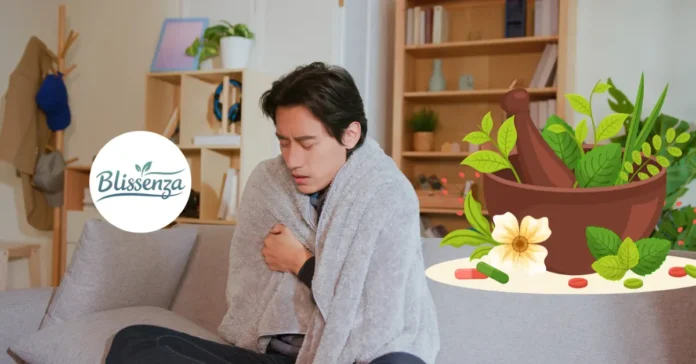 A man wrapped in a blanket on a couch looking unwell, next to an illustration of a mortar and pestle filled with medicinal herbs and capsules.