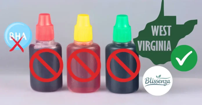 Three small bottles of red, yellow, and green food coloring with red 'prohibited' symbols over them, next to a green map of West Virginia.