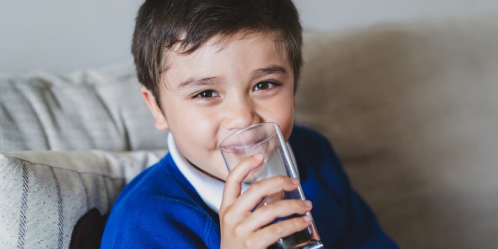 Boy drinking soda