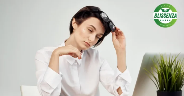Woman falling asleep in front of computer after eating